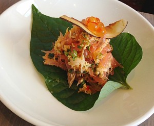 smoked trout served on a betel leaf